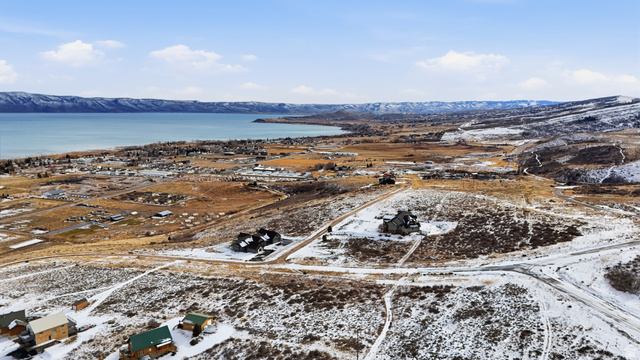661 Raspberry Patch Road Garden City, UT 84028 - Photo 7 of 9 Aerial view of a mountainous background