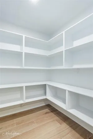 a view of a room with shelves