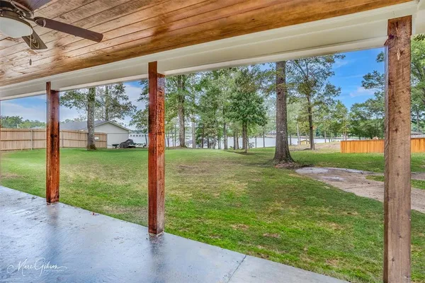 a view of a porch with a big yard