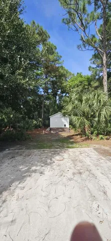 a view of a wooden deck with a bench
