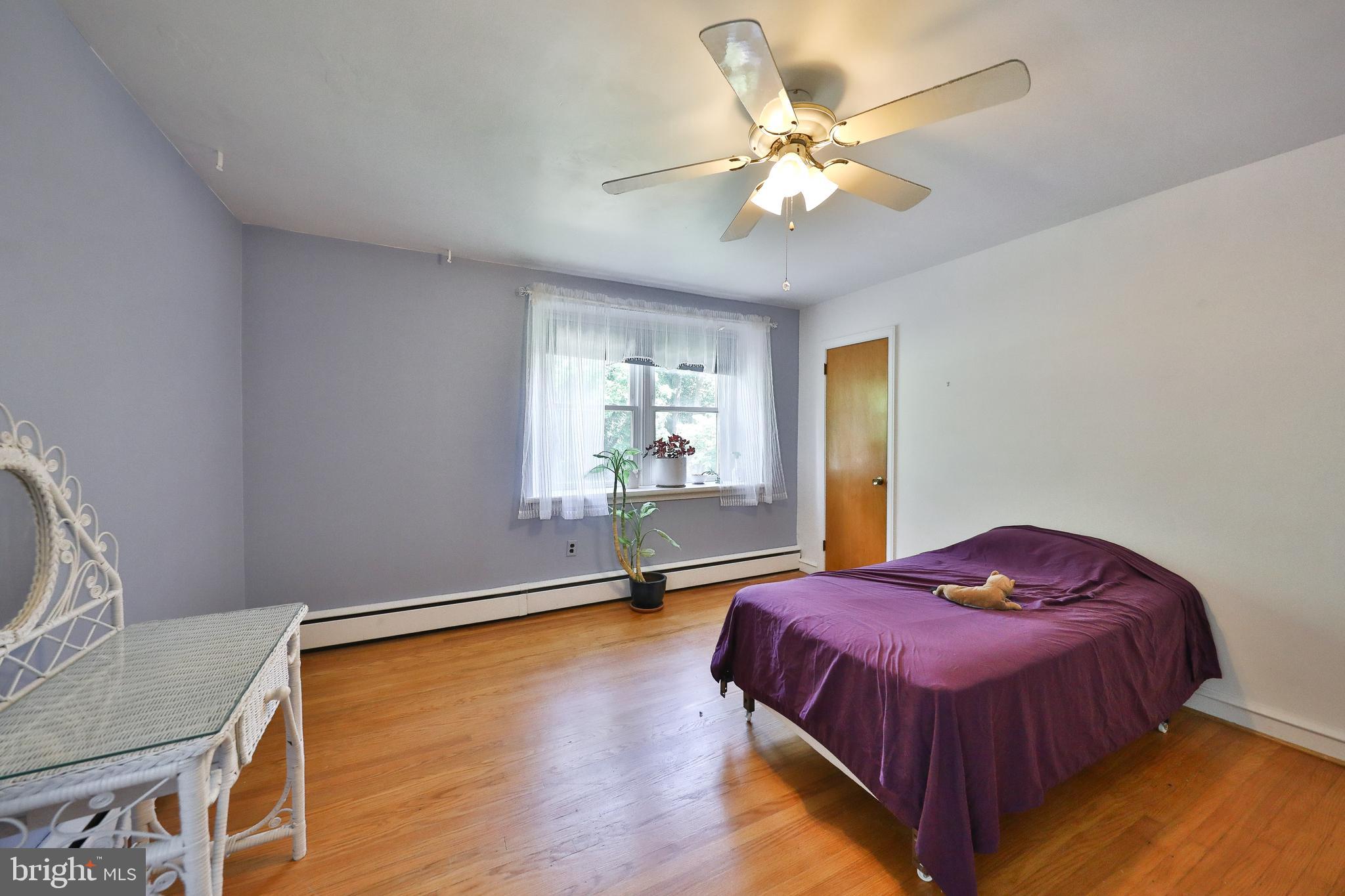 720 Camberly Road Glenside, PA 19038 - Photo 22 of 29 Bedroom with Light Kit Fan, Baseboard heat