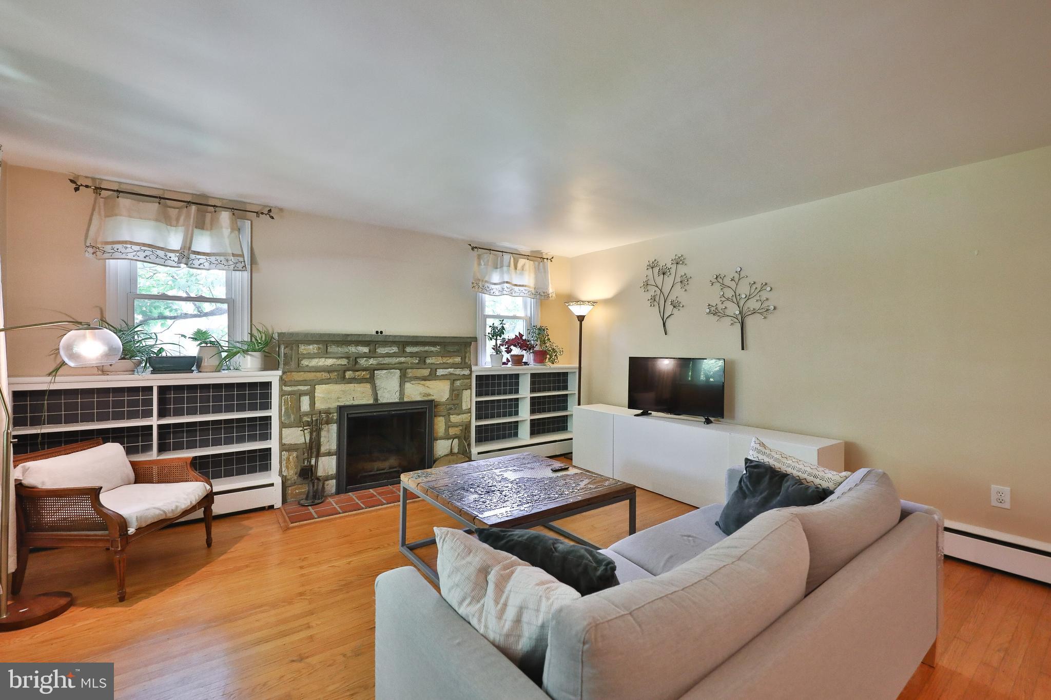 720 Camberly Road Glenside, PA 19038 - Photo 8 of 29 Living Room with Stone FP and Built-in s