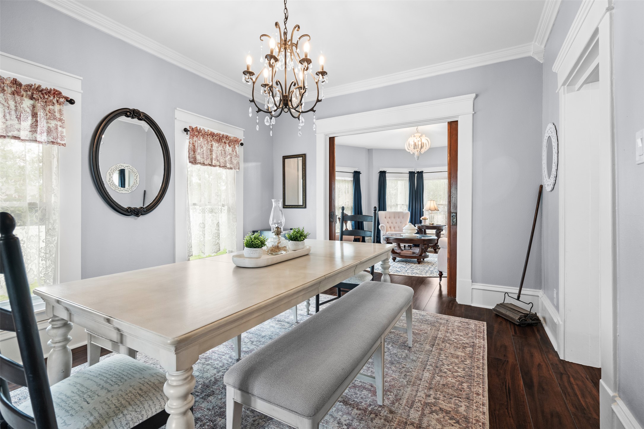 508 Main Street Marble Falls, TX 78654 - Photo 9 of 30 Dining area with baseboards, an inviting chandelier and ornamental molding