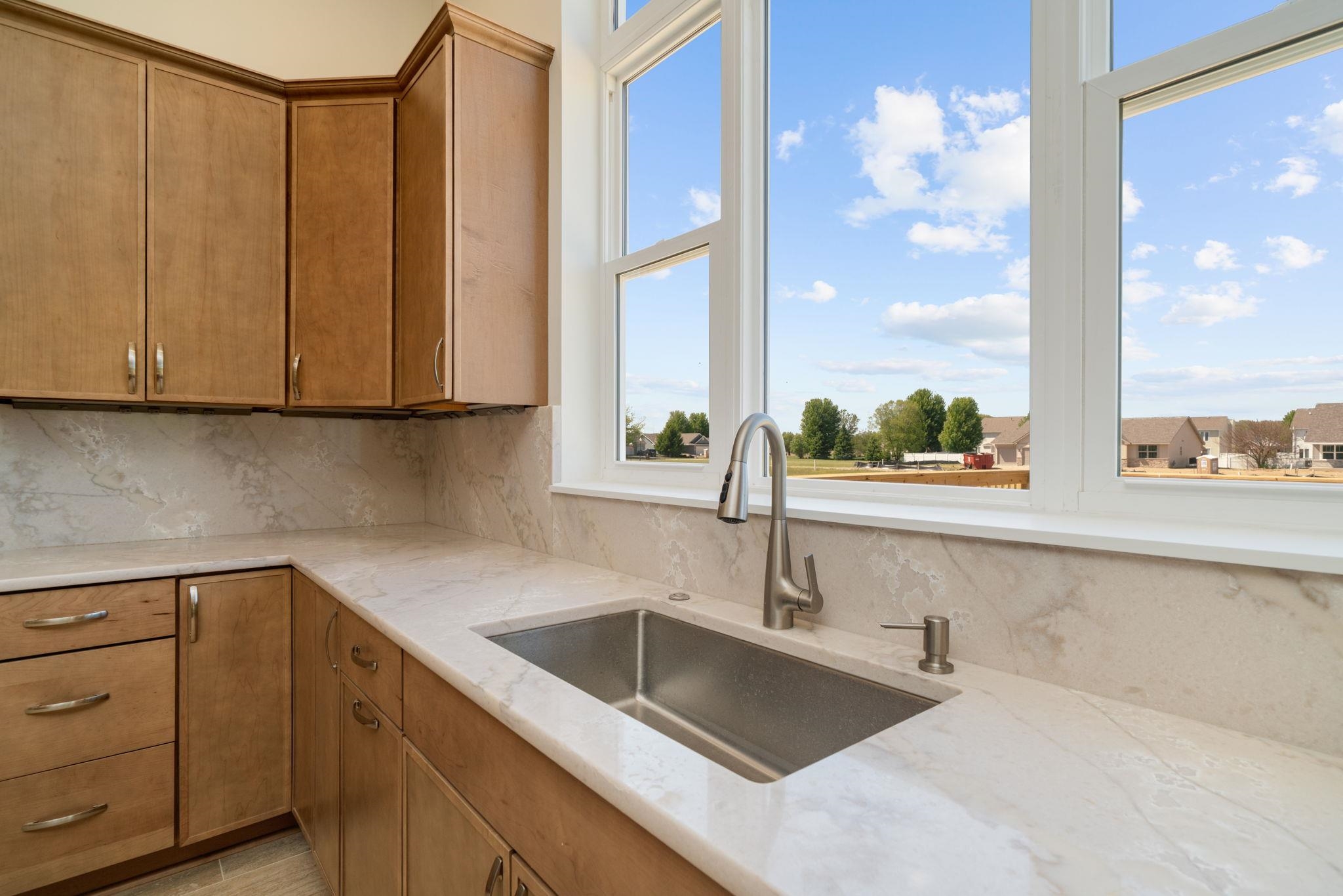 5145 Sycamore Ridge Road Belvidere, IL 61008 - Photo 18 of 57 a kitchen with a sink and large window