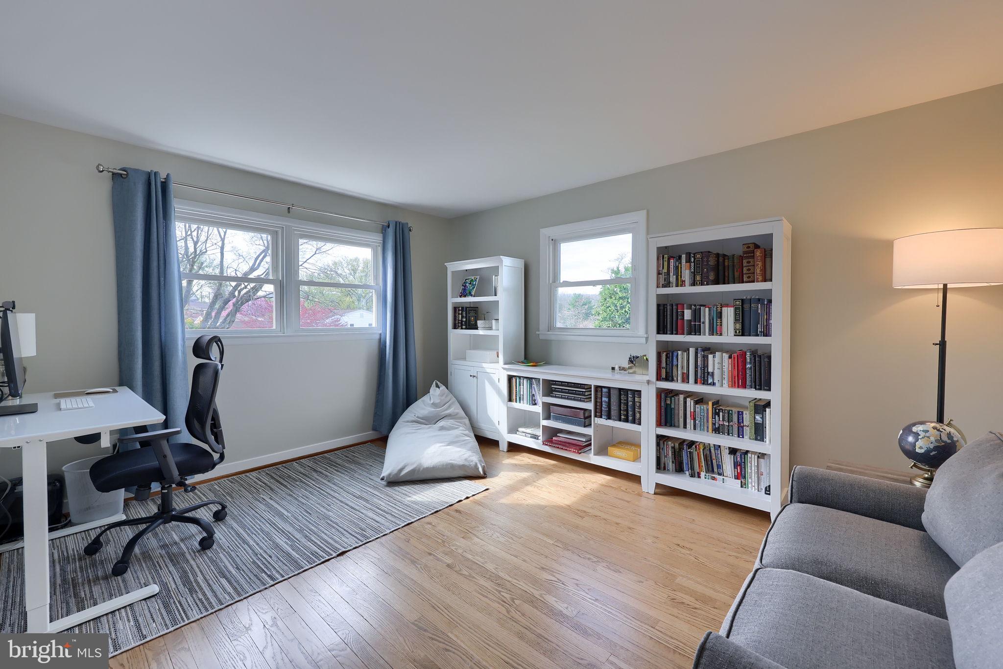 67 Oberlin Avenue Reading, PA 19608 - Photo 17 of 25 a living room with furniture and a book shelf