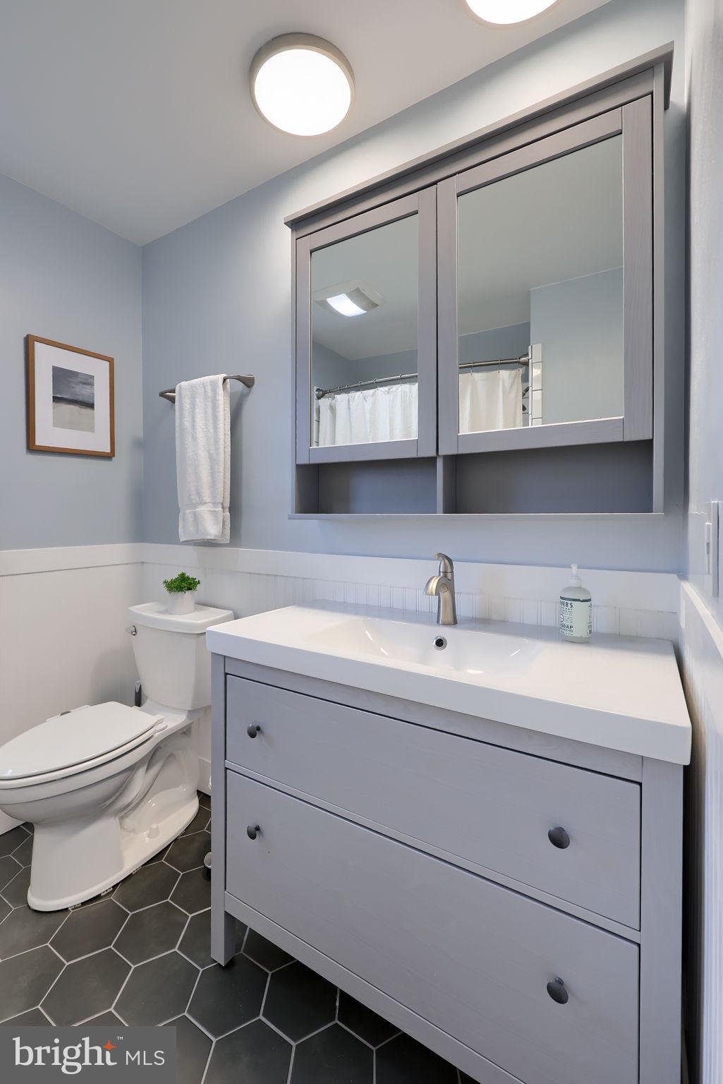 67 Oberlin Avenue Reading, PA 19608 - Photo 18 of 25 a bathroom with a toilet sink and mirror
