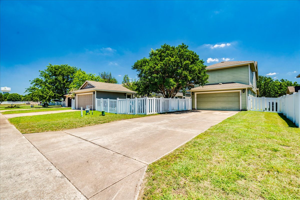 1507 Davis Mountain Loop Cedar Park, TX 78613 - Photo 23 of 30 Rear of property with a two-car garage