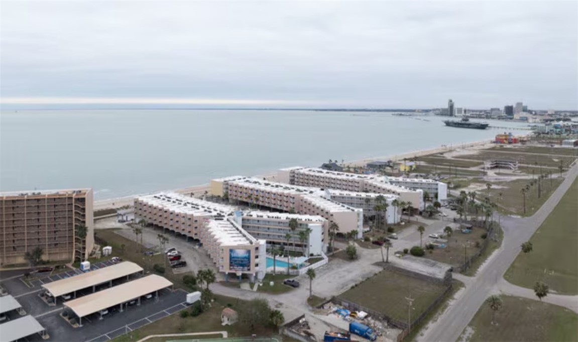 3938 Surfside Boulevard, Unit 3222 Corpus Christi, TX 78402 - Photo 8 of 9 a view of terrace with wooden floor