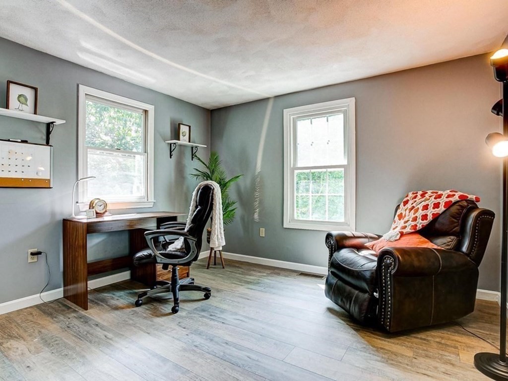 226 Allen Road Billerica, MA 01821 - Photo 17 of 25 a living room with furniture window and a wooden floor