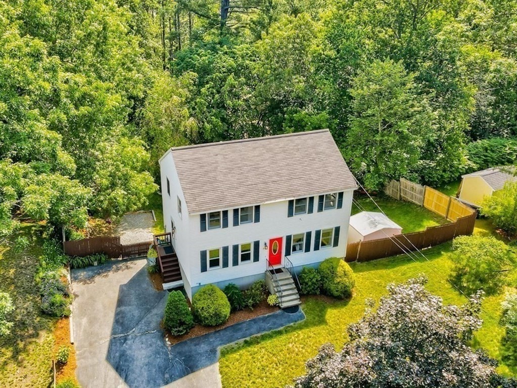 226 Allen Road Billerica, MA 01821 - Photo 3 of 25 an aerial view of a house with yard patio and green space