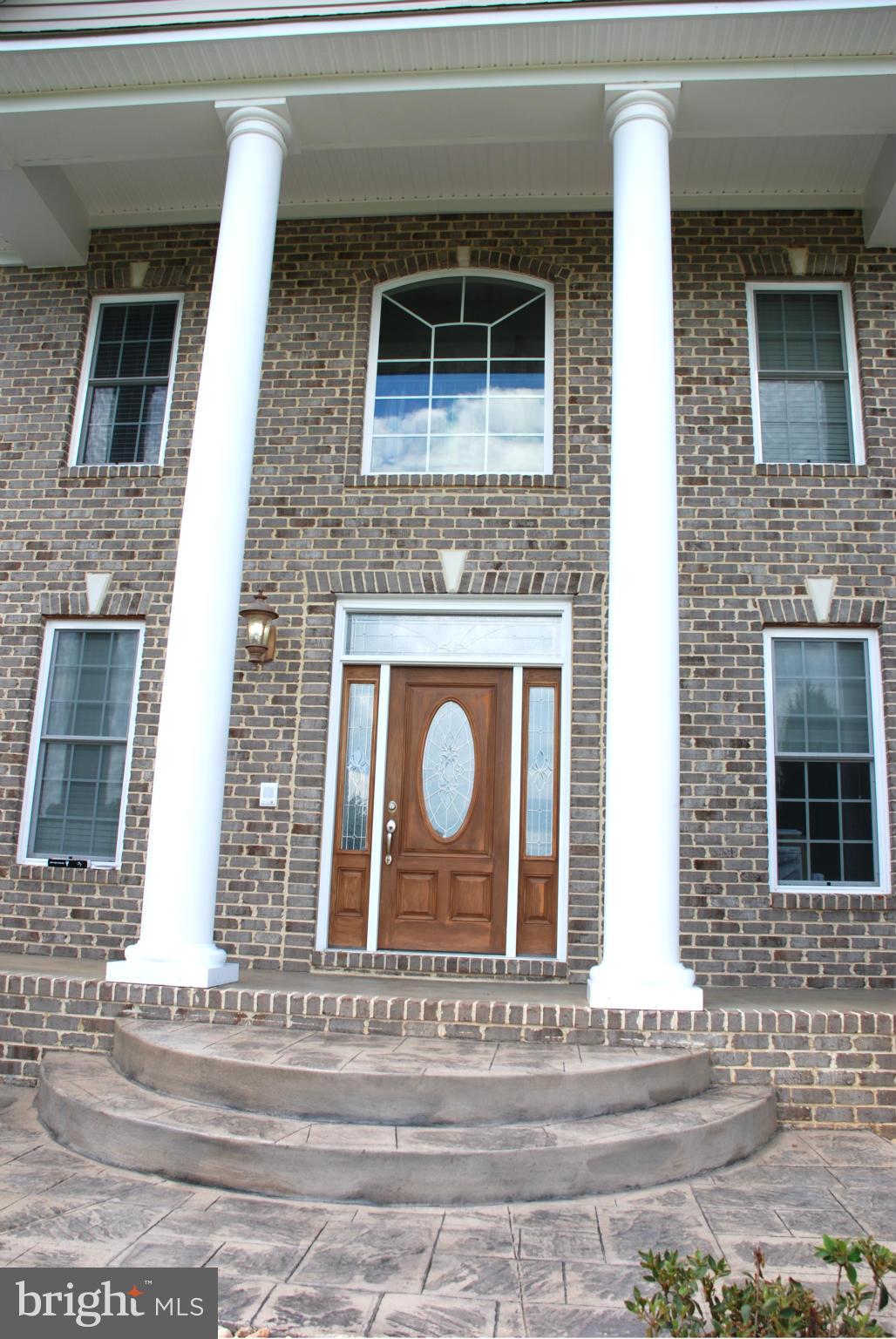 6015 Boston Ridge Court Boston, VA 22713 - Photo 2 of 30 a front view of a house with a yard