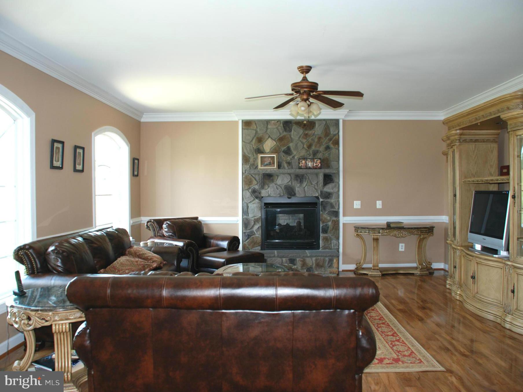 6015 Boston Ridge Court Boston, VA 22713 - Photo 11 of 30 a living room with furniture and a fireplace