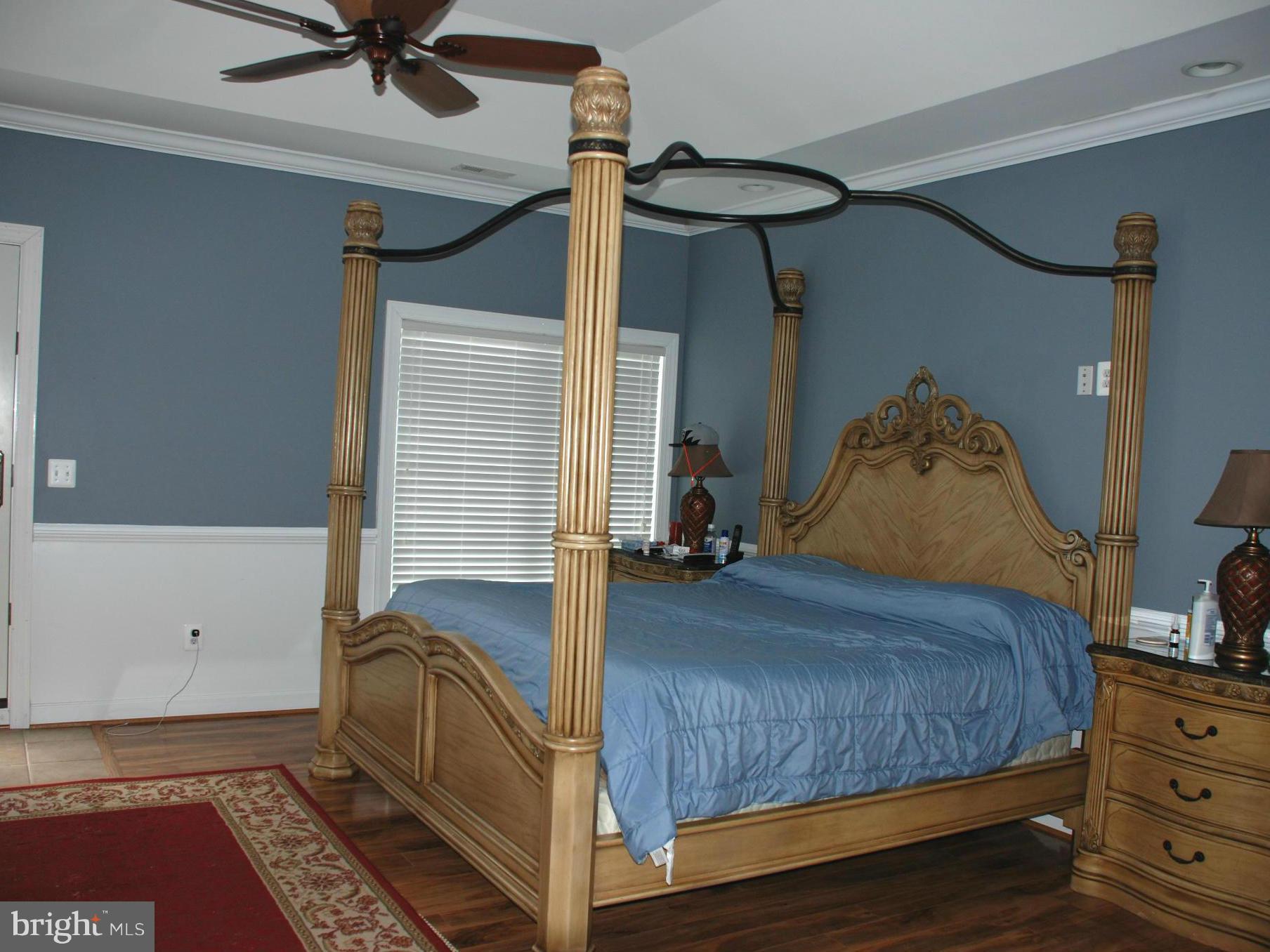 6015 Boston Ridge Court Boston, VA 22713 - Photo 20 of 30 a bedroom with a bed and a dresser