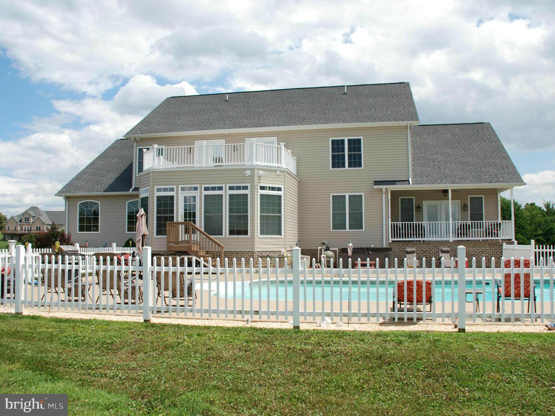 6015 Boston Ridge Court Boston, VA 22713 - Photo 26 of 30 a front view of a house with a yard table and chairs