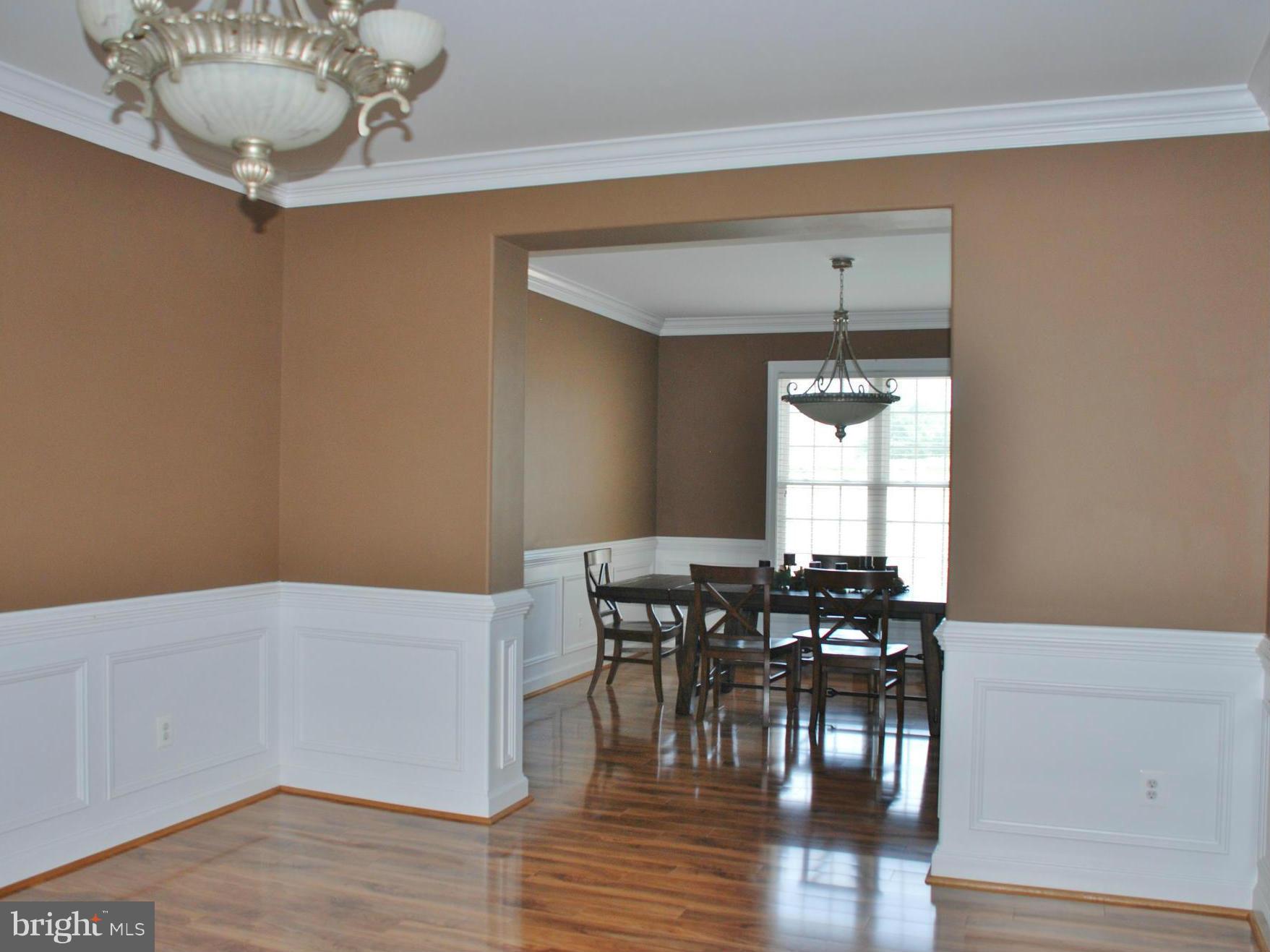 6015 Boston Ridge Court Boston, VA 22713 - Photo 4 of 30 a view of a dining room with furniture and wooden floor