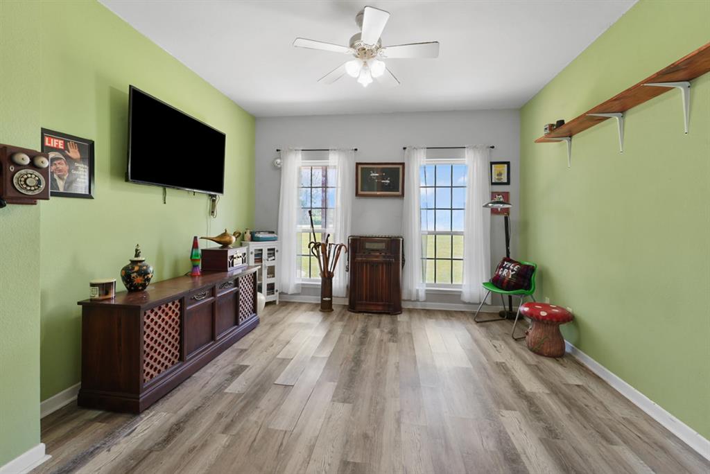 155 Rs County Road Emory, TX 75440 - Photo 15 of 31 a living room with furniture and a flat screen tv