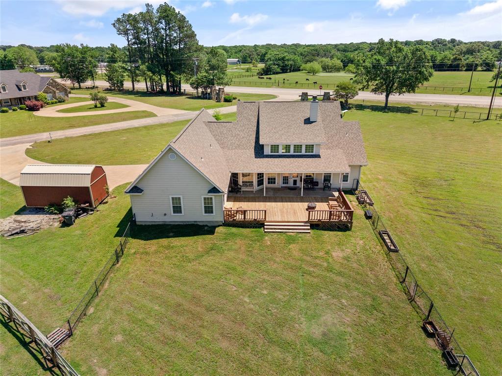 155 Rs County Road Emory, TX 75440 - Photo 25 of 31 a swimming pool with outdoor seating and yard