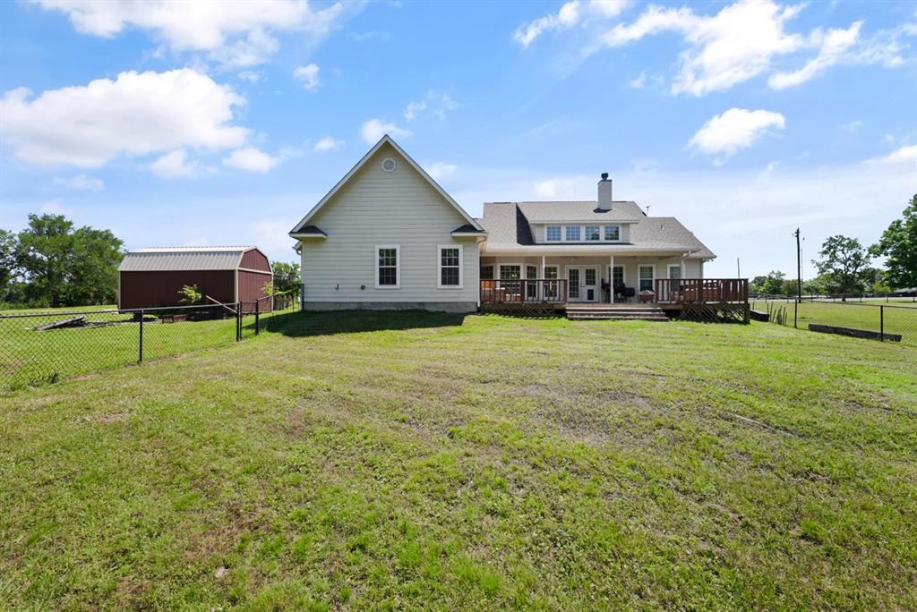 155 Rs County Road Emory, TX 75440 - Photo 26 of 31 a view of a house with a yard and sitting area