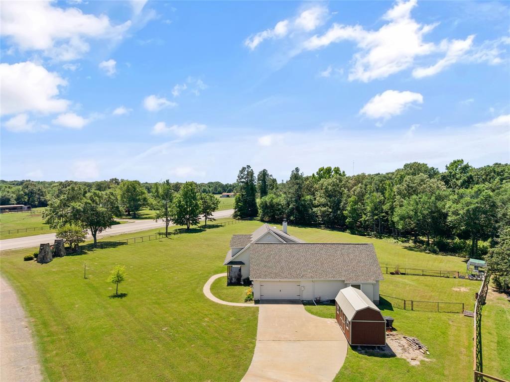 155 Rs County Road Emory, TX 75440 - Photo 6 of 31 a view of a swimming pool with a yard