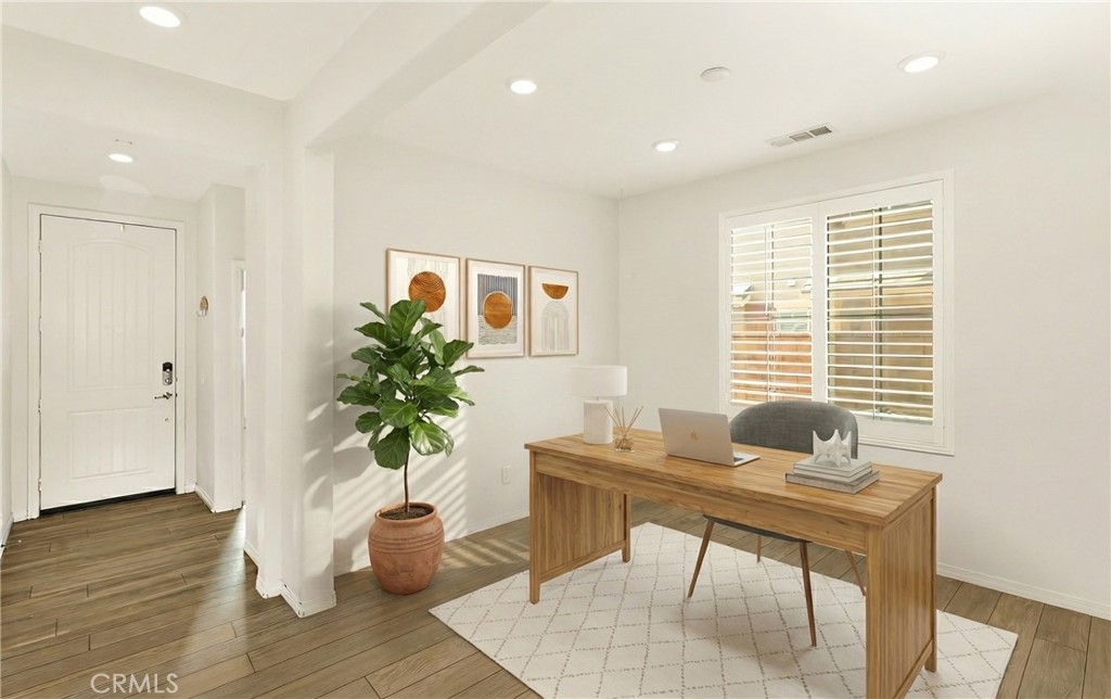 13170 Winslow Drive Rancho Cucamonga, CA 91739 - Photo 6 of 57 a workspace with furniture and a potted plant