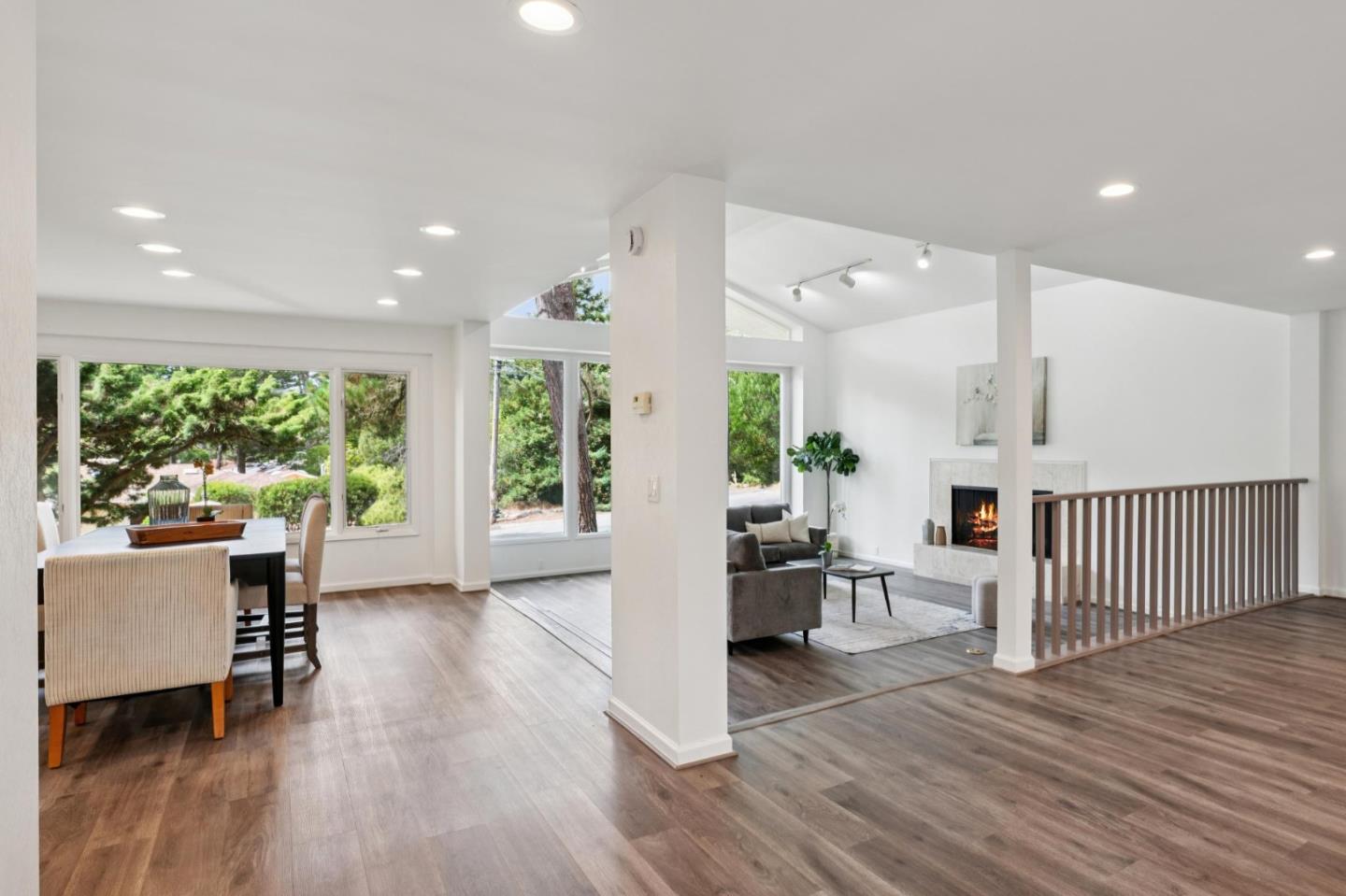 4083 Sunset Lane Pebble Beach, CA 93953 - Photo 11 of 54 a living room with furniture and a wooden floor
