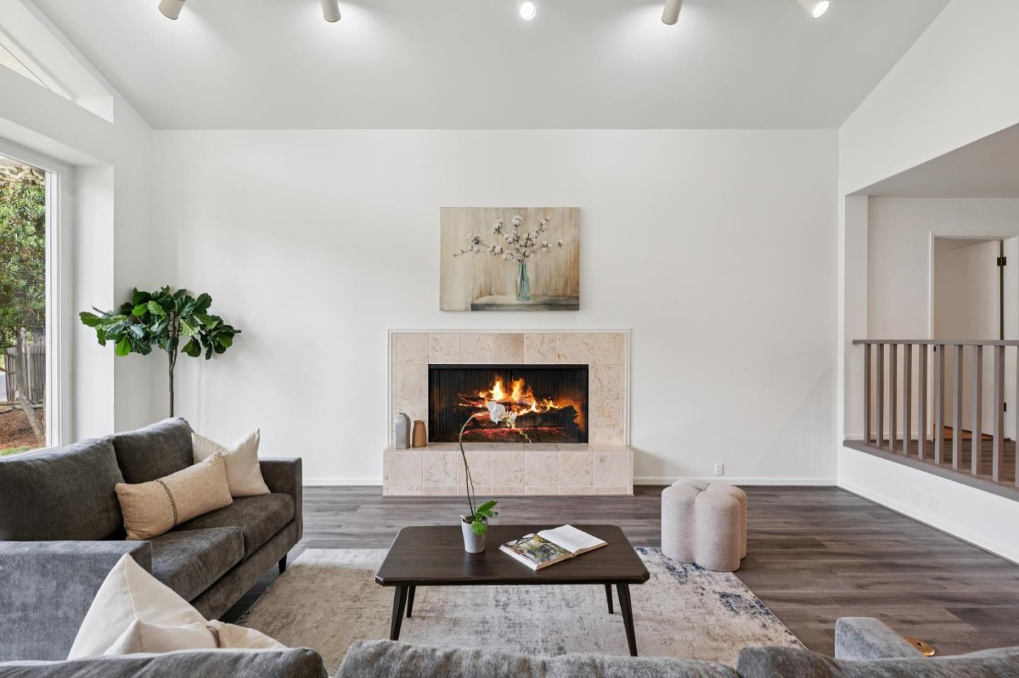 4083 Sunset Lane Pebble Beach, CA 93953 - Photo 12 of 54 a living room with furniture and a fireplace