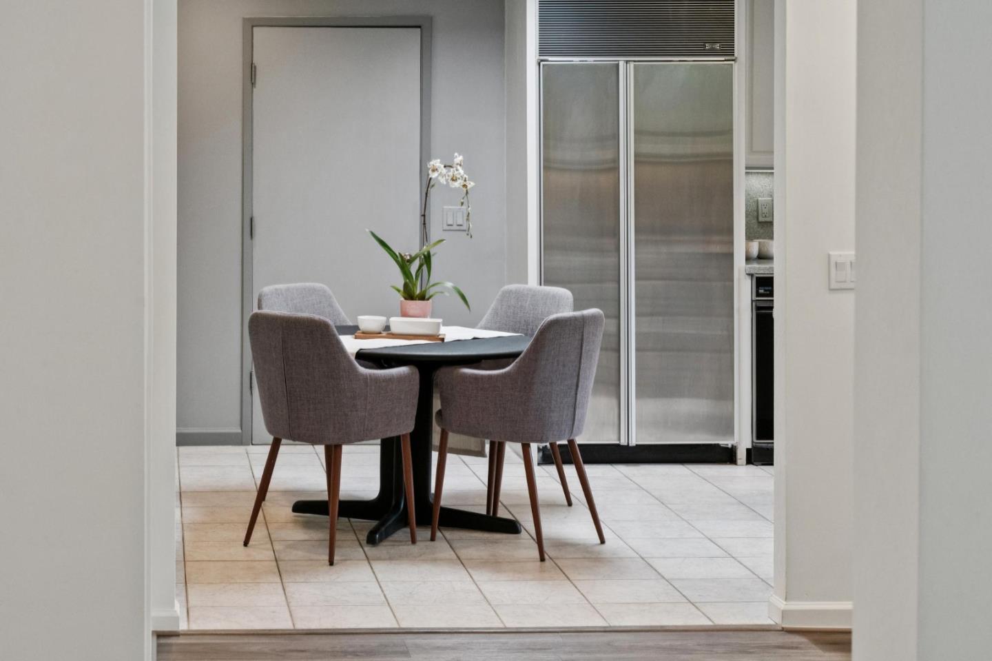 4083 Sunset Lane Pebble Beach, CA 93953 - Photo 18 of 54 a dining room with furniture and a potted plant
