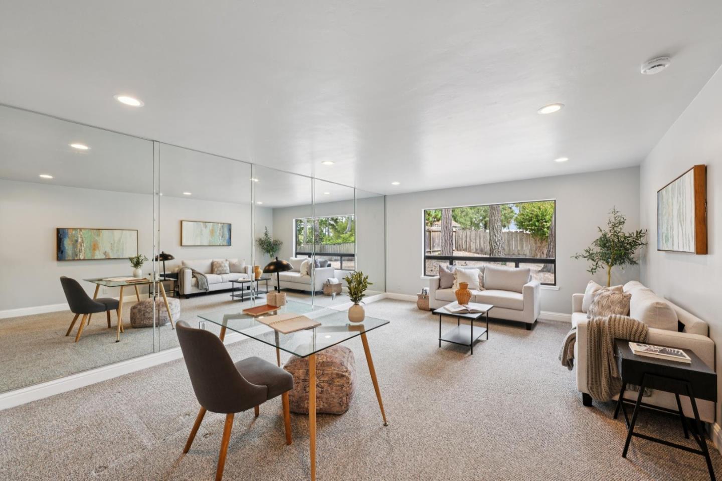 4083 Sunset Lane Pebble Beach, CA 93953 - Photo 41 of 54 a living room with furniture and a large window