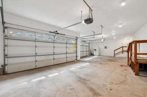 a view of backyard and tree