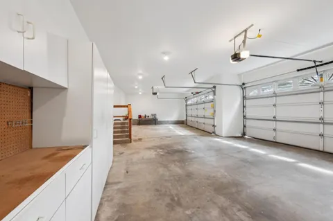 a view of a backyard with trees