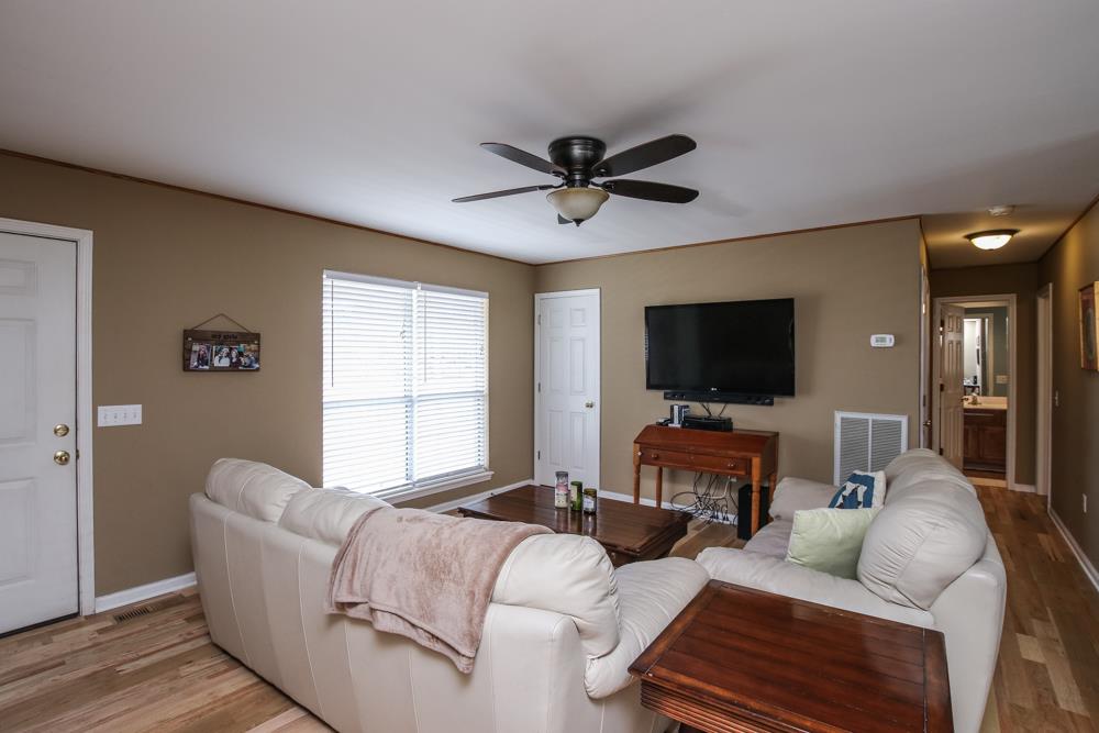 611 Audrey Road Mount Juliet, TN 37122 - Photo 3 of 24 a living room with furniture and a flat screen tv