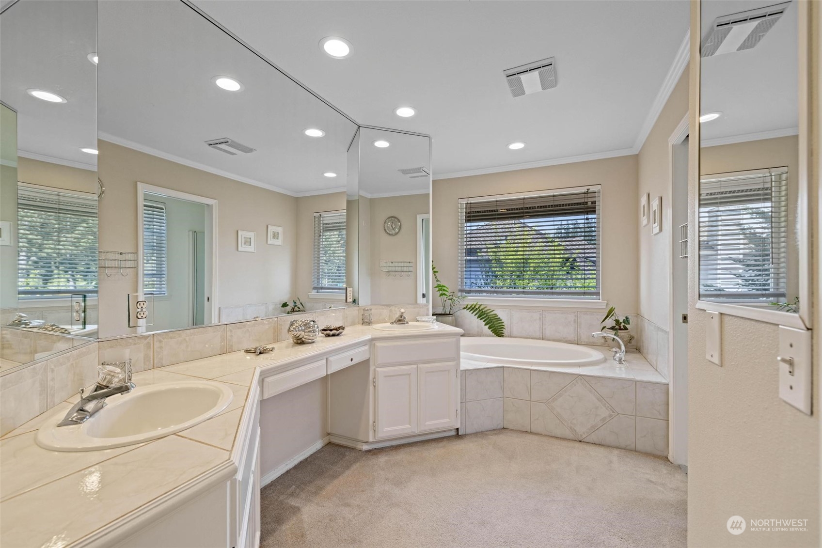 37607 18th Place South Federal Way, WA 98003 - Photo 30 of 40 a large white bathroom with a large tub a sink and mirror