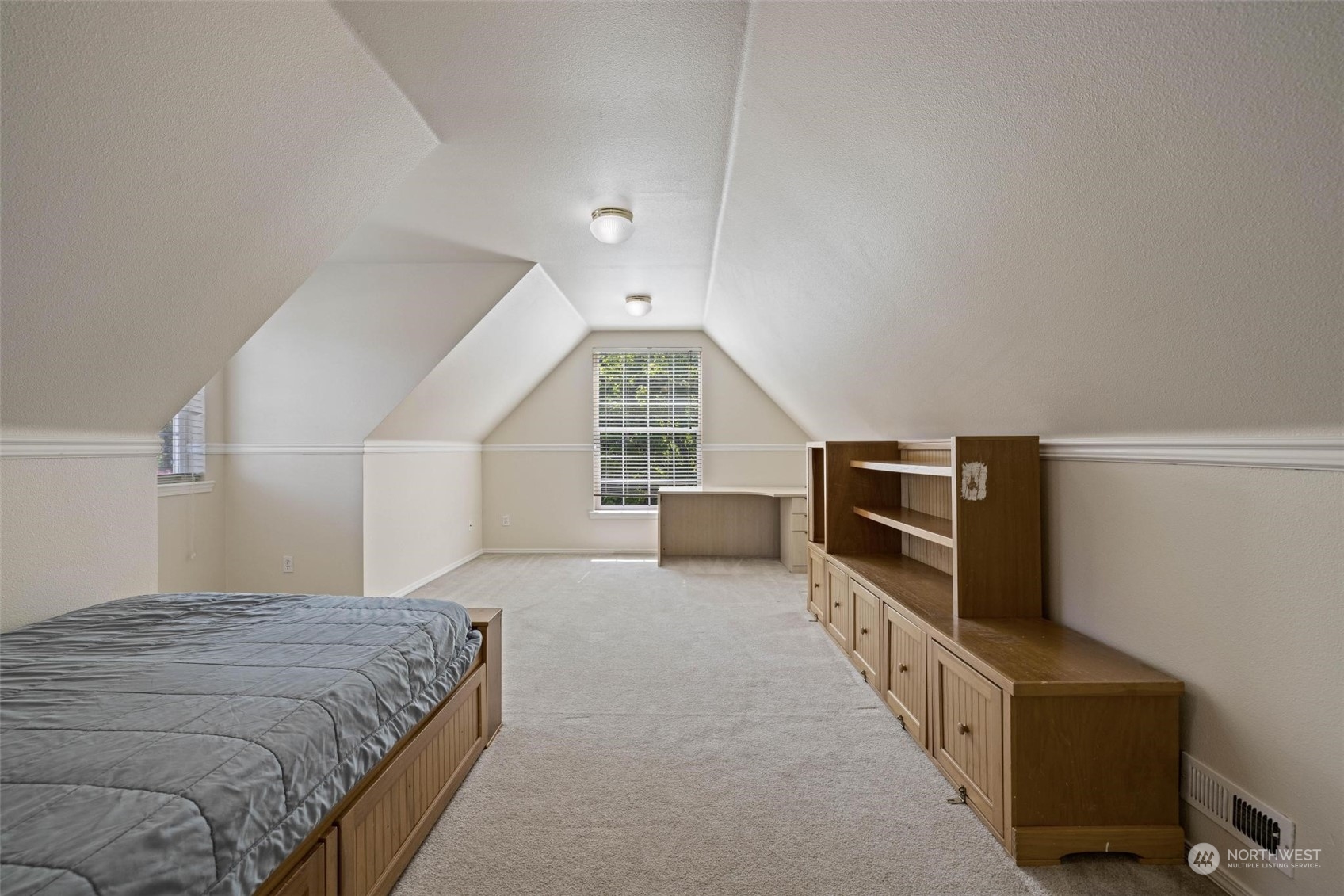 37607 18th Place South Federal Way, WA 98003 - Photo 37 of 40 a bedroom with furniture and a flat screen tv