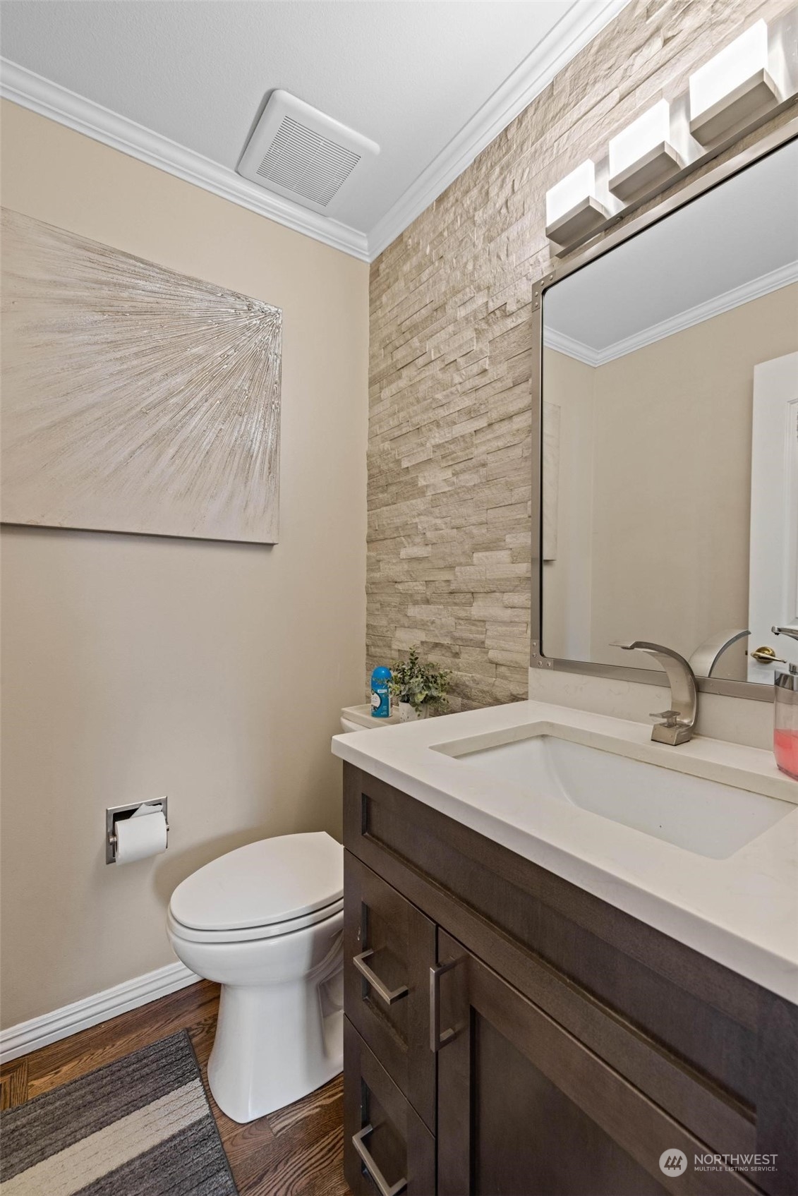 37607 18th Place South Federal Way, WA 98003 - Photo 39 of 40 a bathroom with a sink a toilet a mirror and vanity