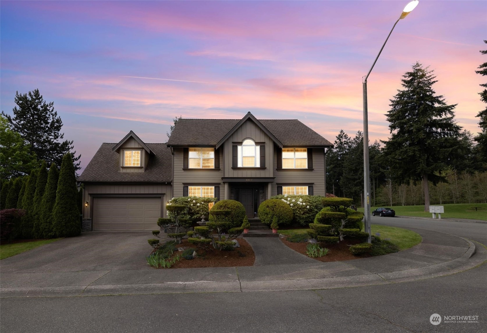 37607 18th Place South Federal Way, WA 98003 - Photo 40 of 40 a front view of a house with garden