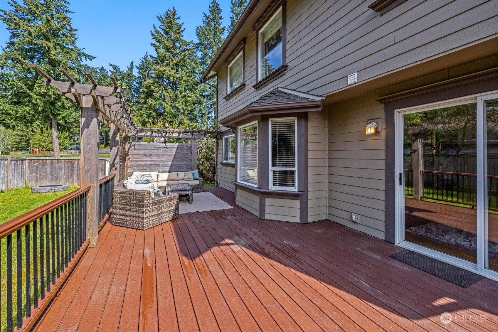 37607 18th Place South Federal Way, WA 98003 - Photo 7 of 40 a view of outdoor sitting area with deck and wooden floor