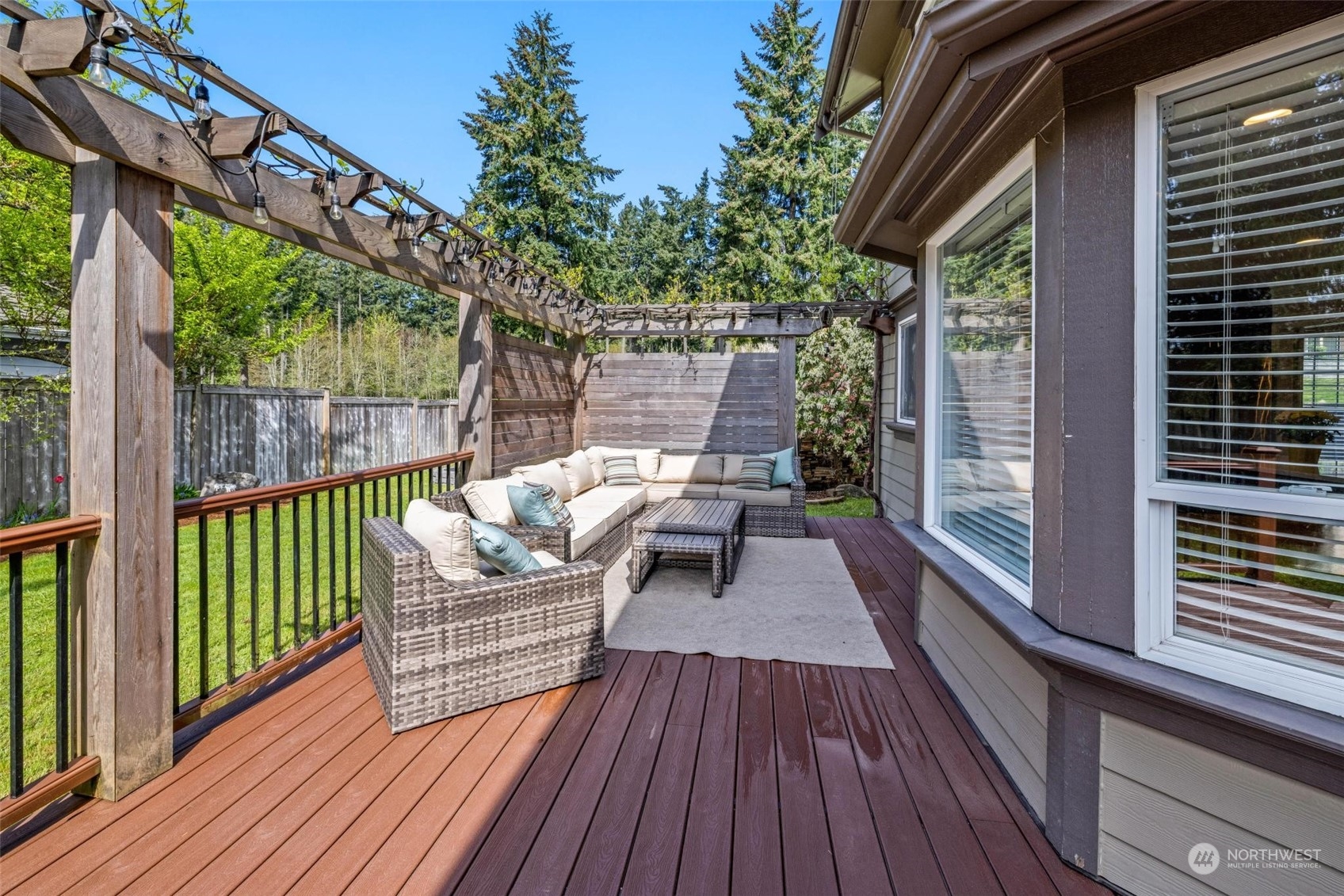 37607 18th Place South Federal Way, WA 98003 - Photo 8 of 40 a view of a deck with wooden floor and outdoor seating