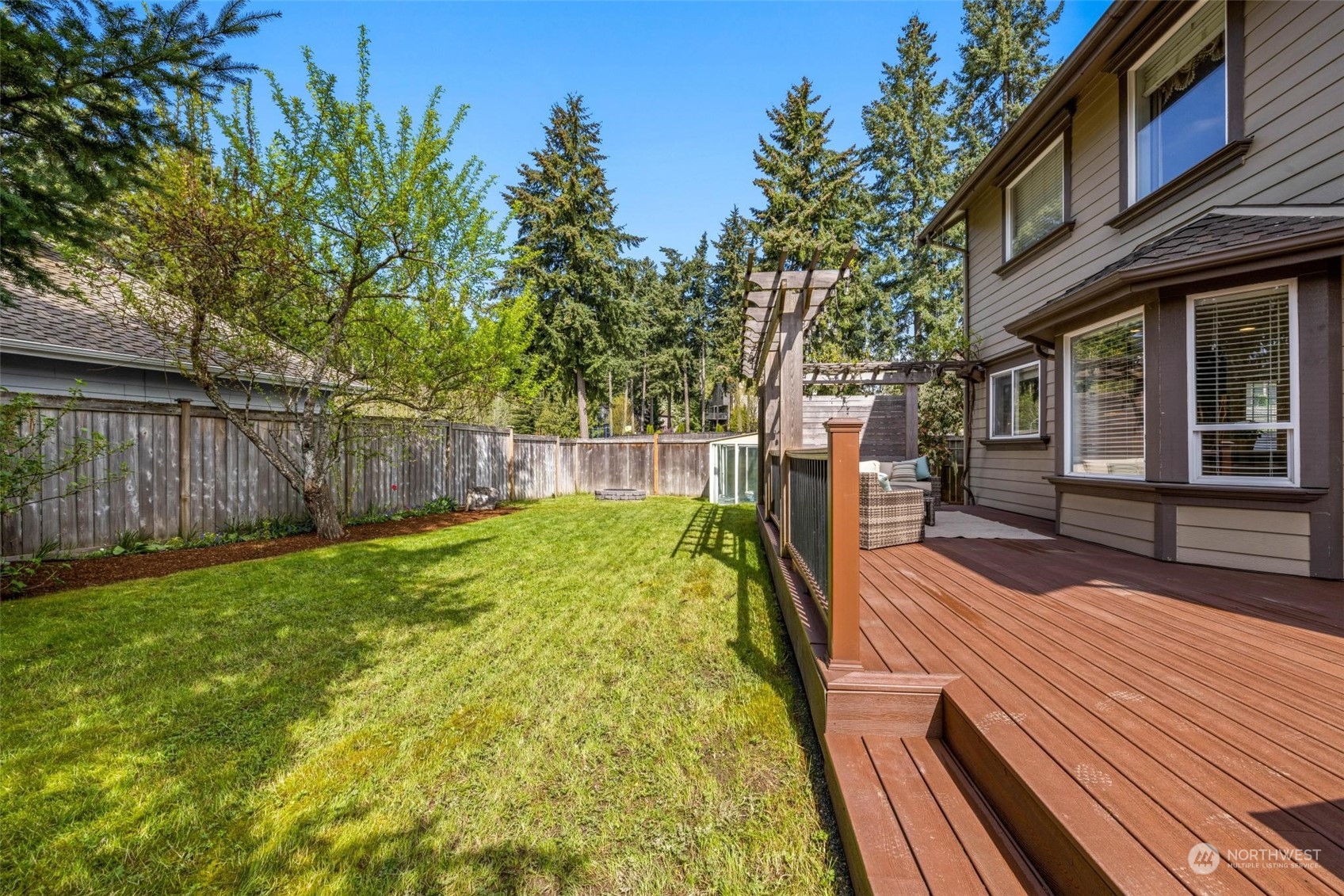37607 18th Place South Federal Way, WA 98003 - Photo 9 of 40 a view of a backyard with sitting area