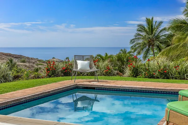 a view of a lake with a yard