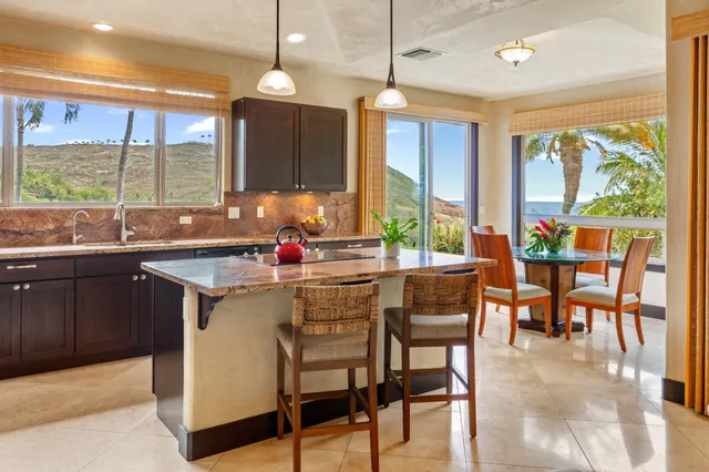 a view of a ocean with a mountain