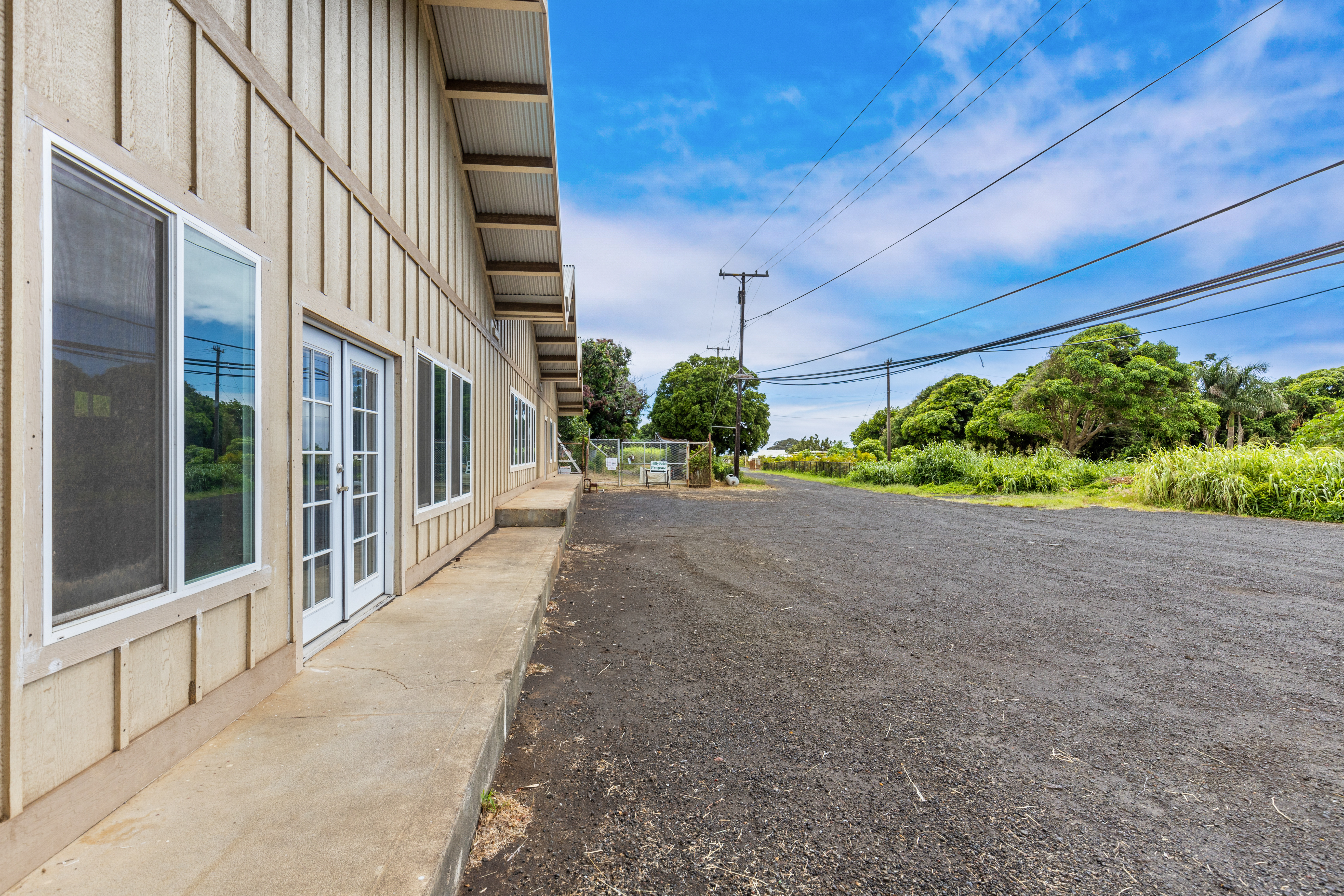95-1178 Kaalaiki Road Naalehu, HI 96772 - Photo 11 of 22 a view of a house with a street