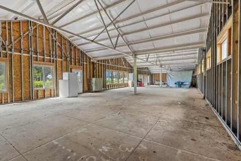 a view of a room with wooden walls