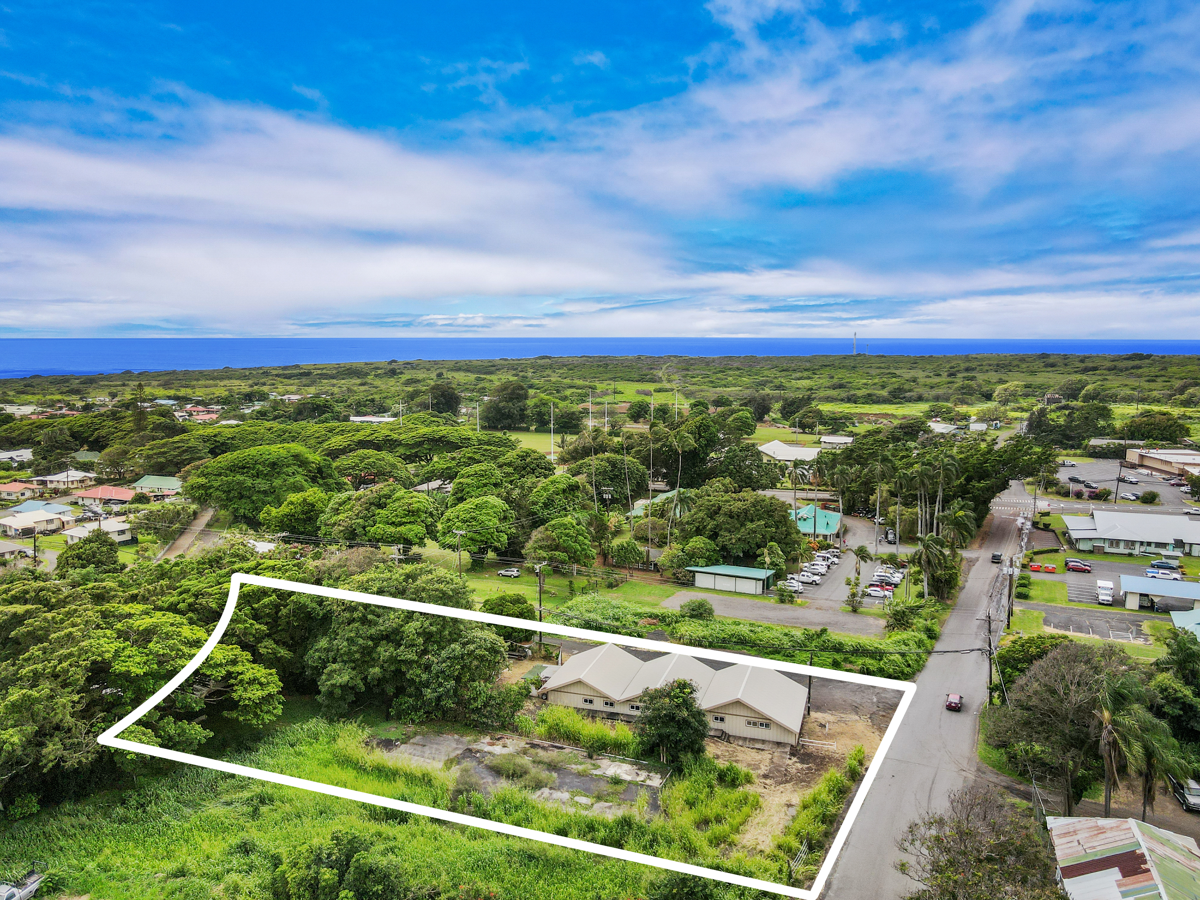95-1178 Kaalaiki Road Naalehu, HI 96772 - Photo 4 of 22 a view of a yard with an outdoor seating