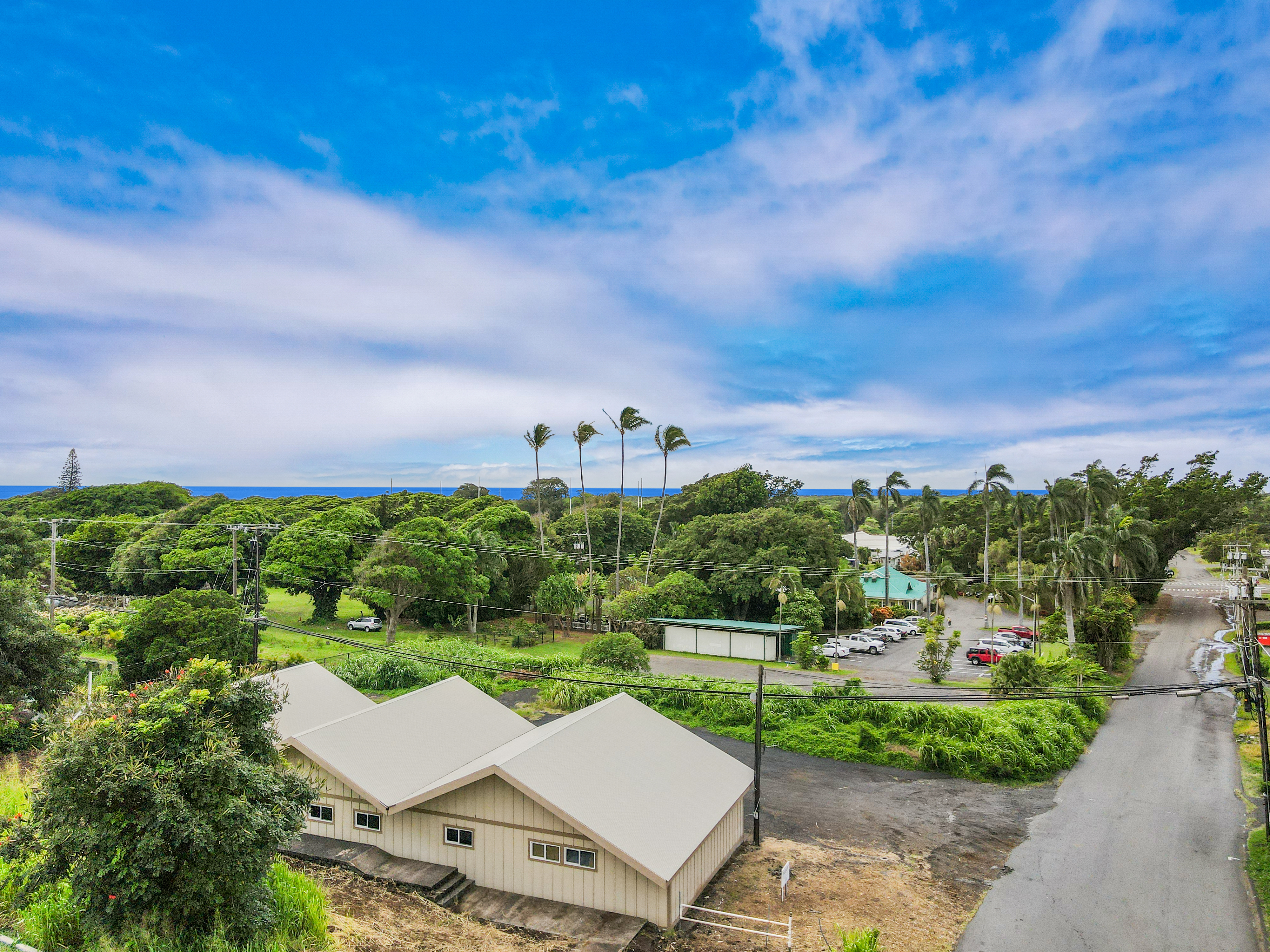 95-1178 Kaalaiki Road Naalehu, HI 96772 - Photo 8 of 22 a view of a table and chairs in backyard