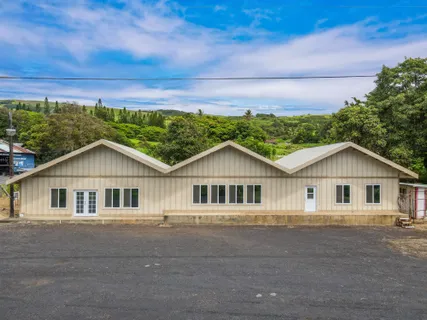 a view of a house with a street