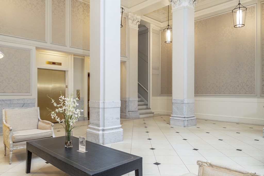 21 Beacon Street, Unit 4S Boston, MA 02108 - Photo 13 of 16 a view of hall way with mirror