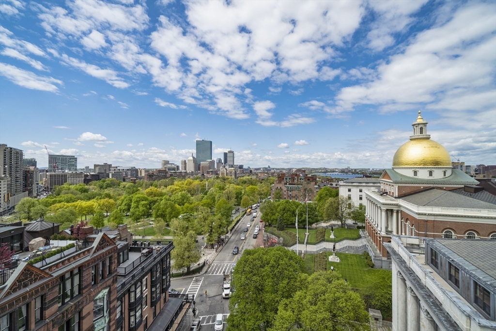 21 Beacon Street, Unit 4S Boston, MA 02108 - Photo 3 of 16 a view of a city from a roof