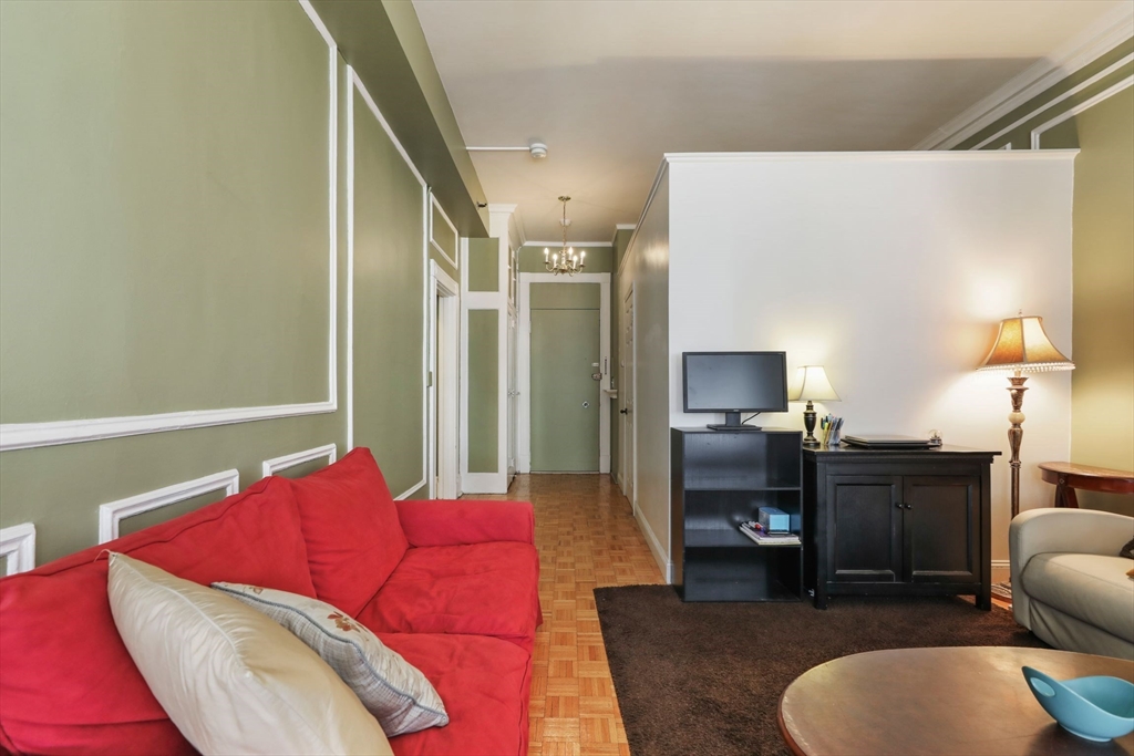 21 Beacon Street, Unit 4S Boston, MA 02108 - Photo 7 of 16 a living room with furniture