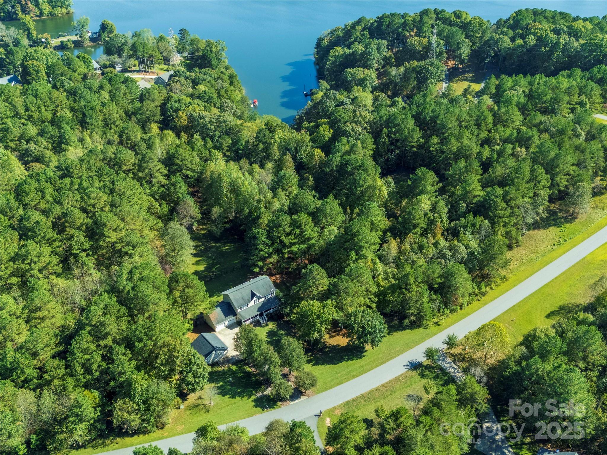 283 Rivercliff Drive, Unit 20 Stony Point, NC 28678 - Photo 14 of 16 an aerial view of residential house with outdoor space and trees all around