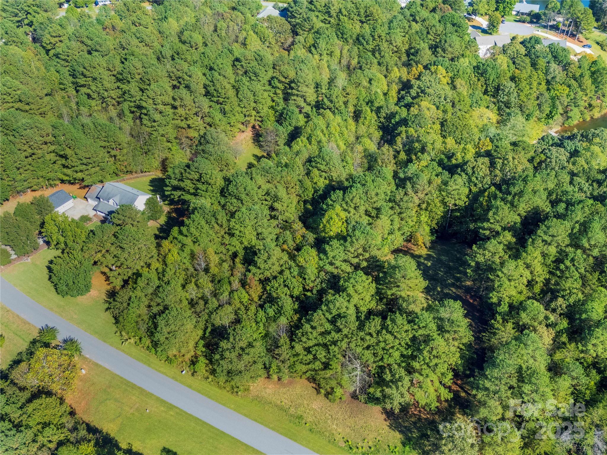 283 Rivercliff Drive, Unit 20 Stony Point, NC 28678 - Photo 16 of 16 a view of a garden with a flower plants